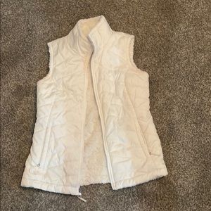 White reversible North Face vest xsmall